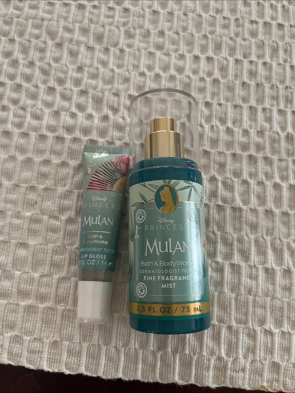 Bath & Body Works Mulan Teal & Gold Fragrance Mist and lip gloss